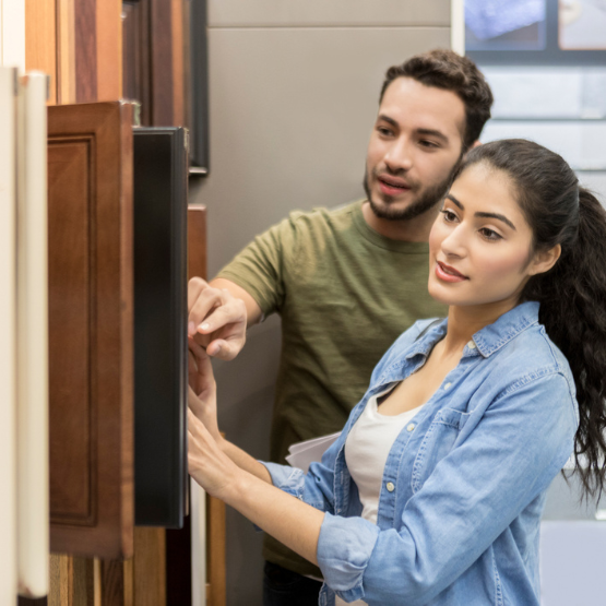 Couple working on home repairs