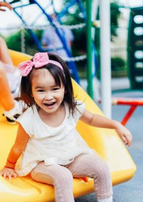 Child on slide at playground