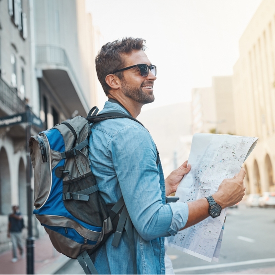 Hiker Traveling with Map