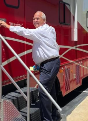 Person near mobile donation truck