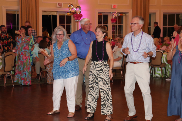 Attendees dancing at Summer Salute event
