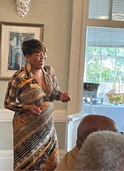 Sondra Collins talking at event
