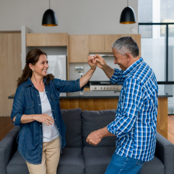 Couple dancing in kitchen