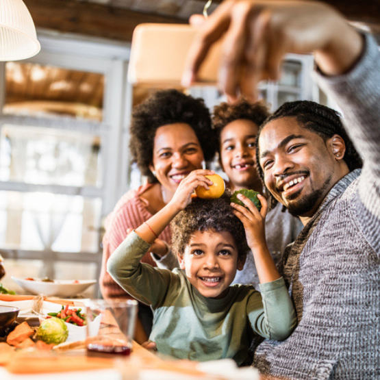 Smiling family in kitchen