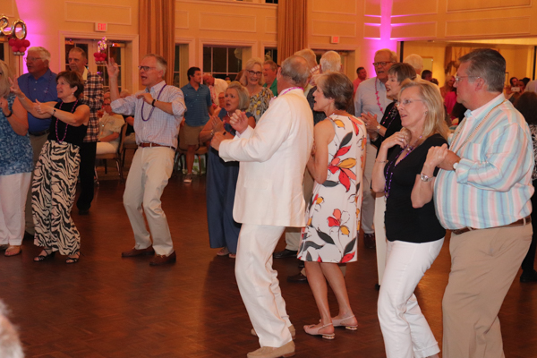 Attendees dancing at Summer Salute event